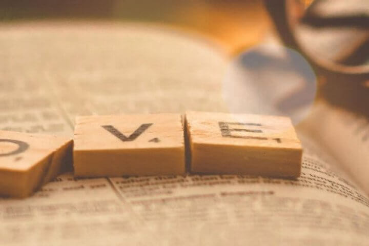 LOVE Scrabble pieces on Bible